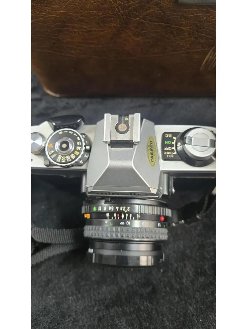 Minolta SLR 35mm Film Camera with Lens, Flash, and Carrying Case